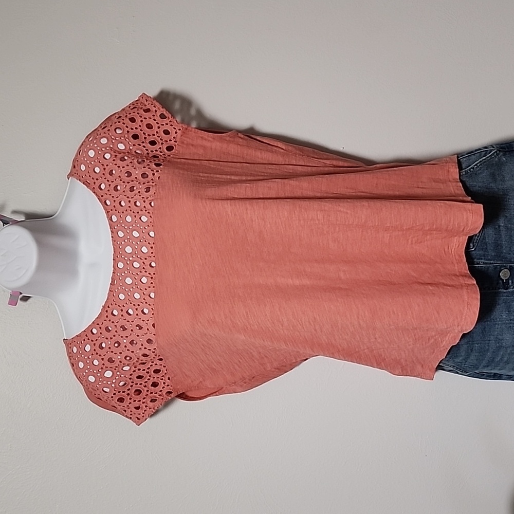 Ann Taylor Loft size medium coral pink top with cool chest design